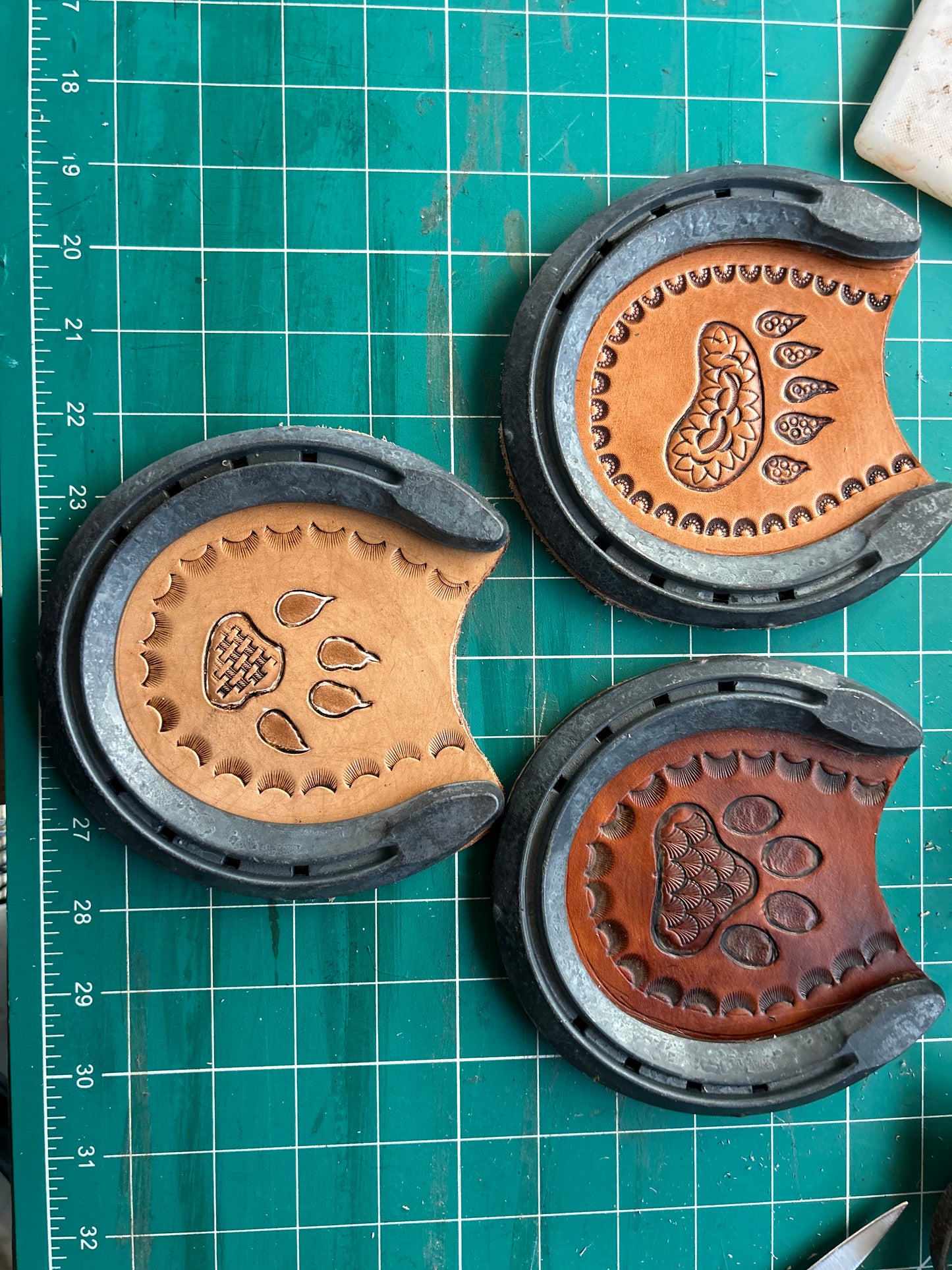 Handmade leather horseshoe coasters